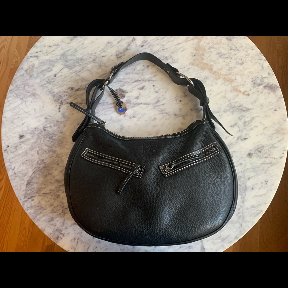 Like new discontinued Dooney&Bourke saddle bag.